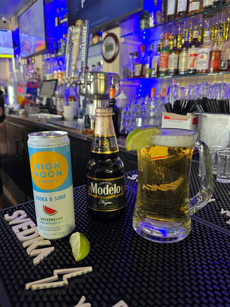 Cisco's Mexican Restaurant: A can of beer and a can of soda on a bar during Happy Hour.