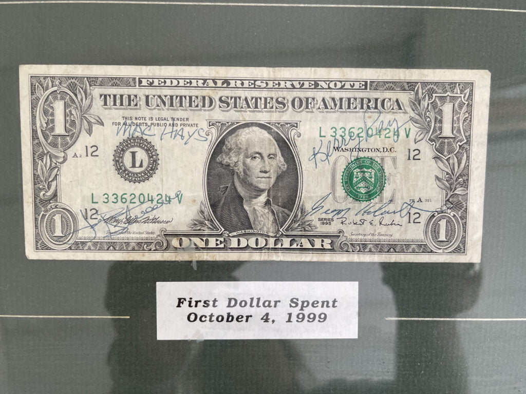 Cisco's Mexican Restaurant: A one dollar bill is on display in a glass case at a Mexican food restaurant.