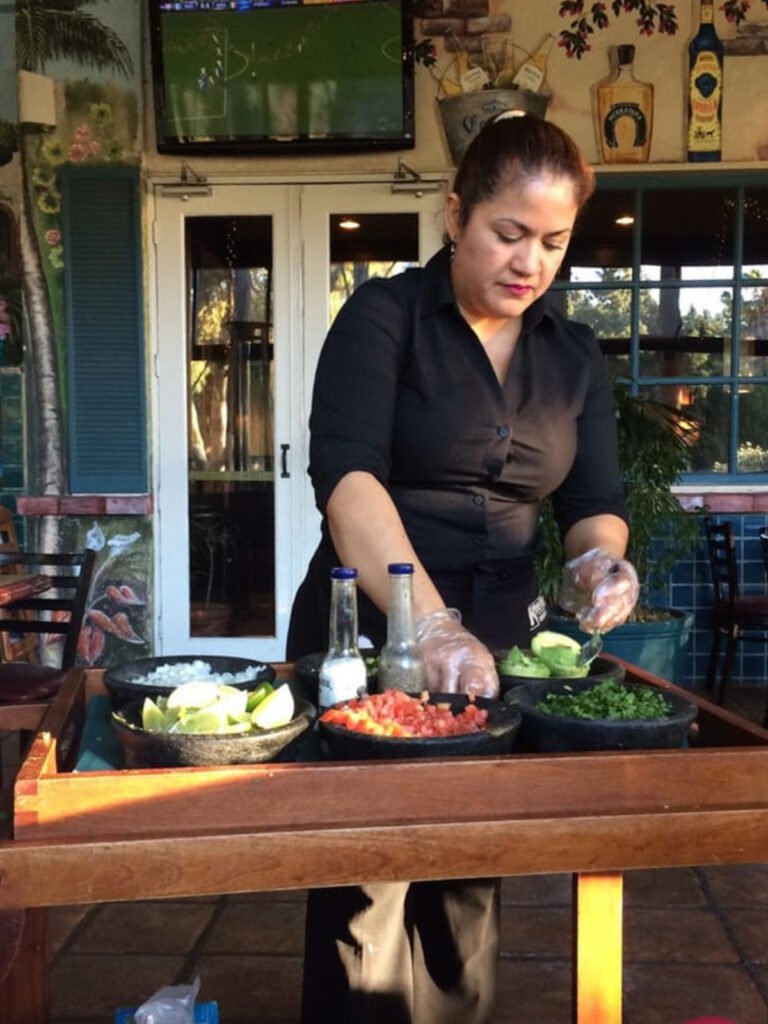 Cisco's Mexican Restaurant: A woman preparing authentic Mexican guacamole.