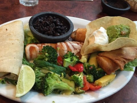 Cisco's Mexican Restaurant: A plate of Mexican food on a table.