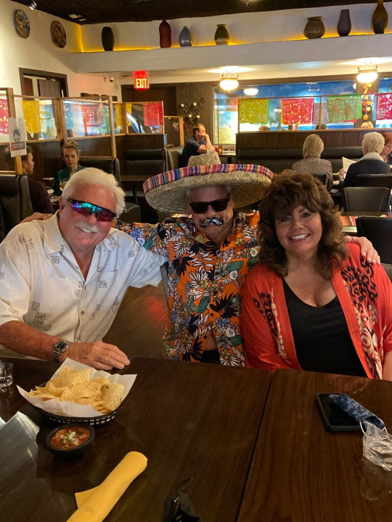 Cisco's Mexican Restaurant: Three people enjoying happy hour while posing for a photo during happy hour.