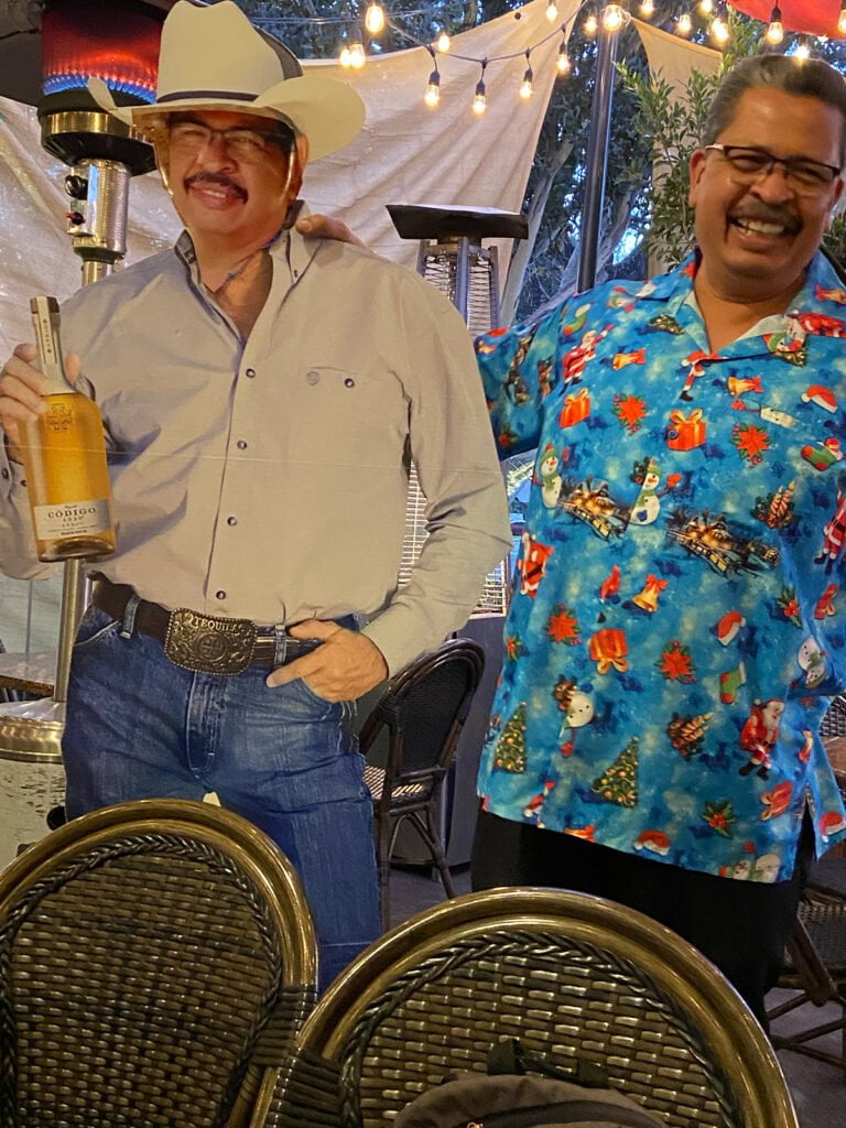 Cisco's Mexican Restaurant: A man standing with a carboard cutout, enjoying Happy Hour with delicious Mexican Food.