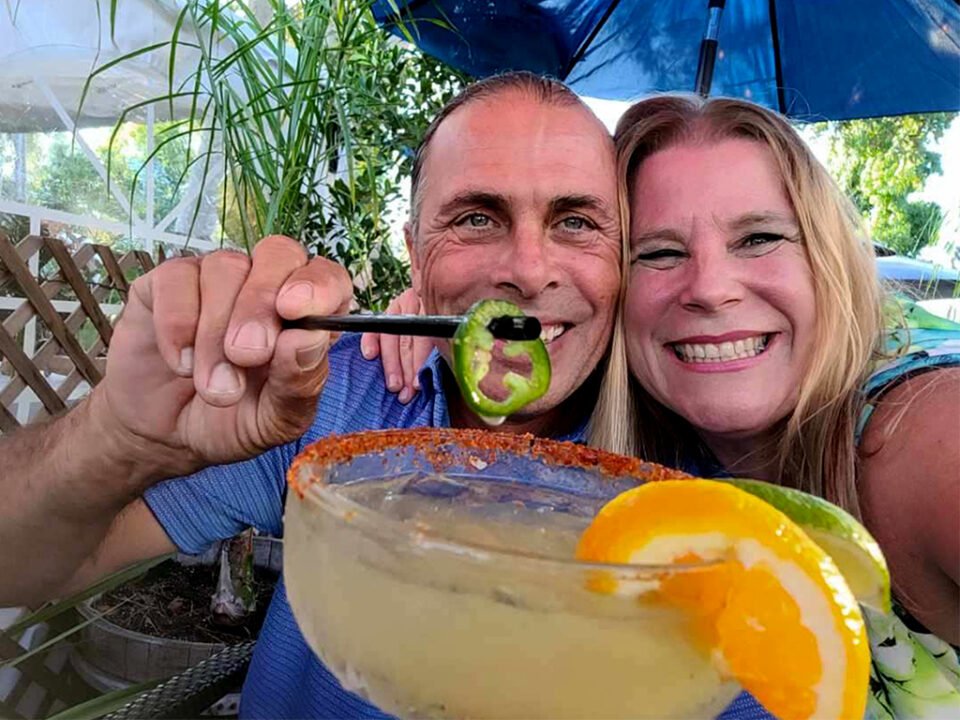 Cisco's Mexican Restaurant: A couple enjoying Happy Hour, taking a selfie with a jalapeño margarita.