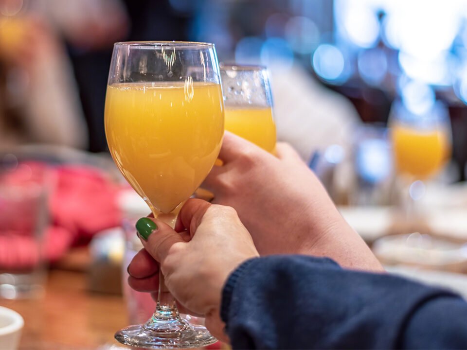 Cisco's Mexican Restaurant: Two people toasting mimosas for Sunday Brunch.